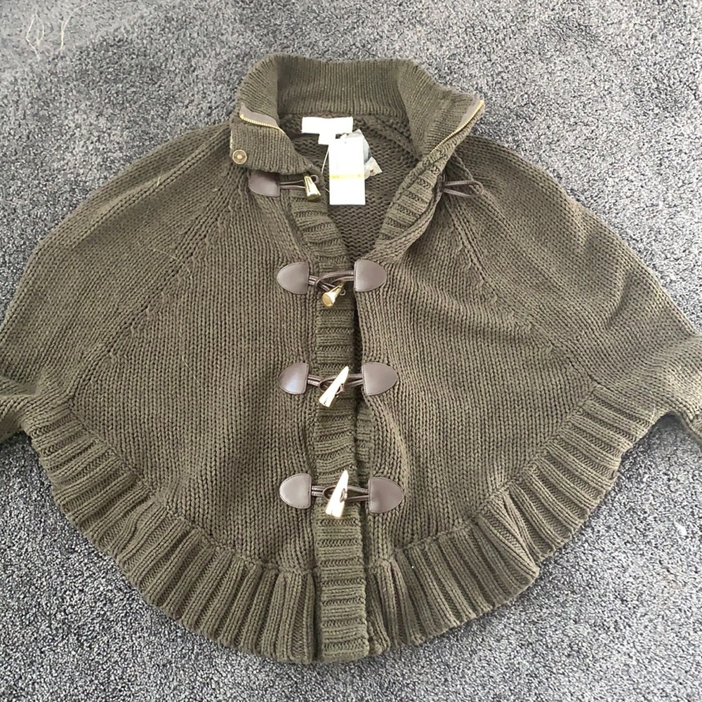 Michael Kors green “cape” size small never worn.